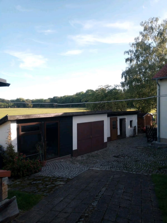 Vielseitiges Wohnensemble mit drei Wohneinheiten, großem Grundstück und moderner Ausstattung 6 zimmer